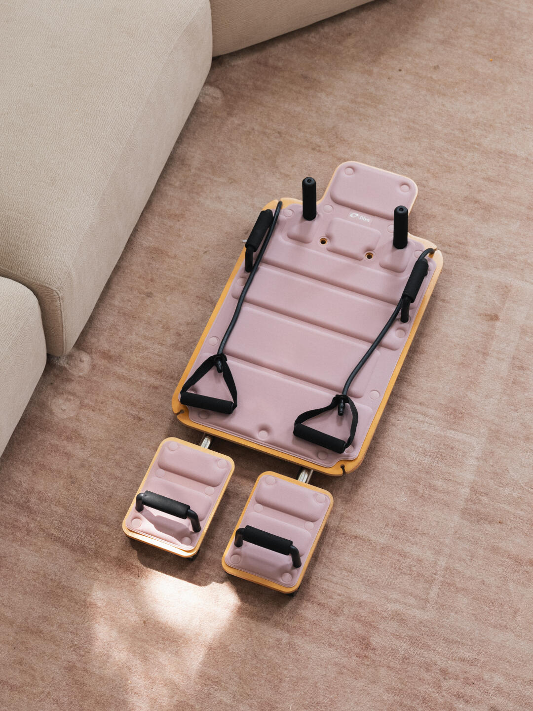 DDiya Studio on a carpet with platforms and resistance straps